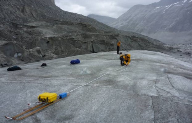 Researchers use a dual frequency penetrating radar on the Fantail Glacier to determine ice mass