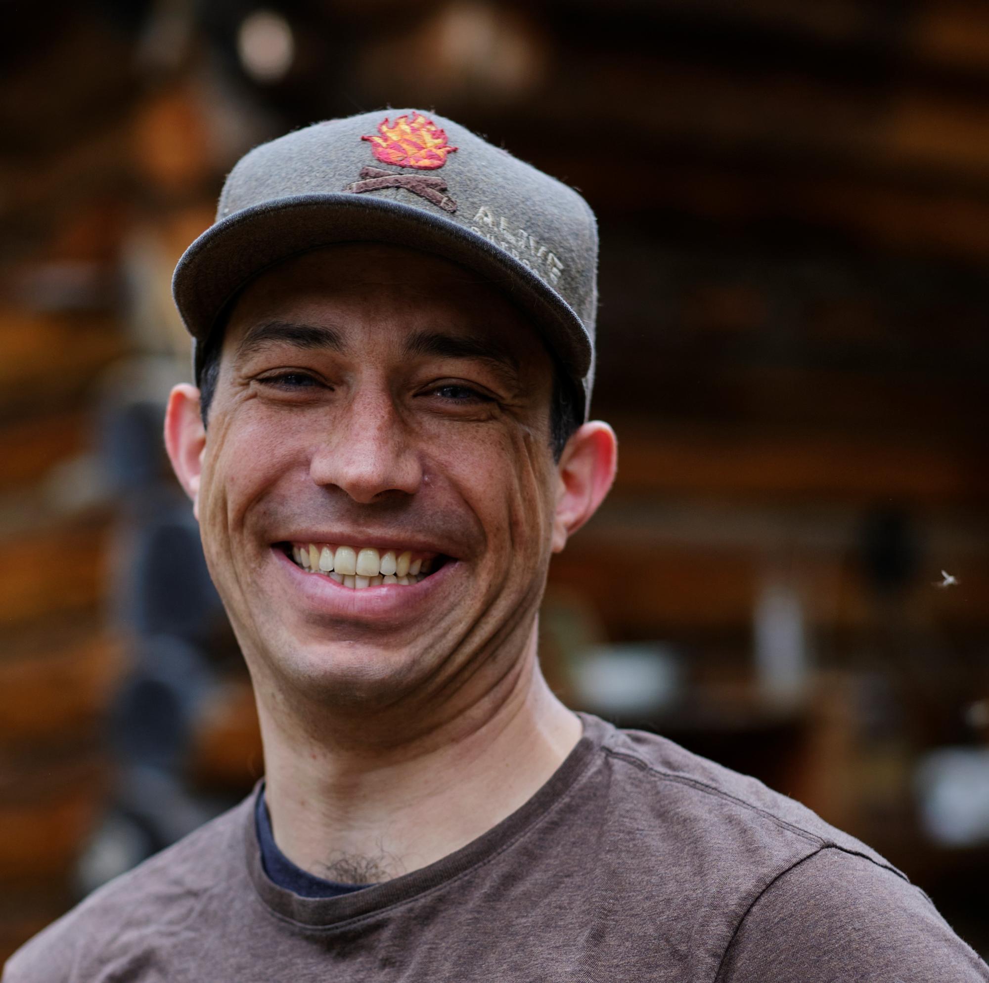 Shaun is welcoming you to chat with his signature contagious grin.