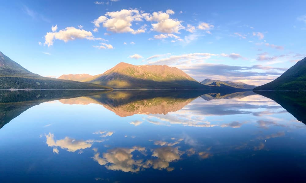 Mountains reflected on a still lake