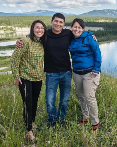 Three students posing near the Yukon River