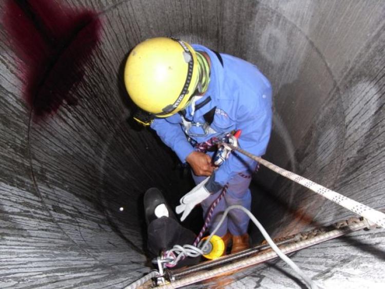 Person going into a confined space.