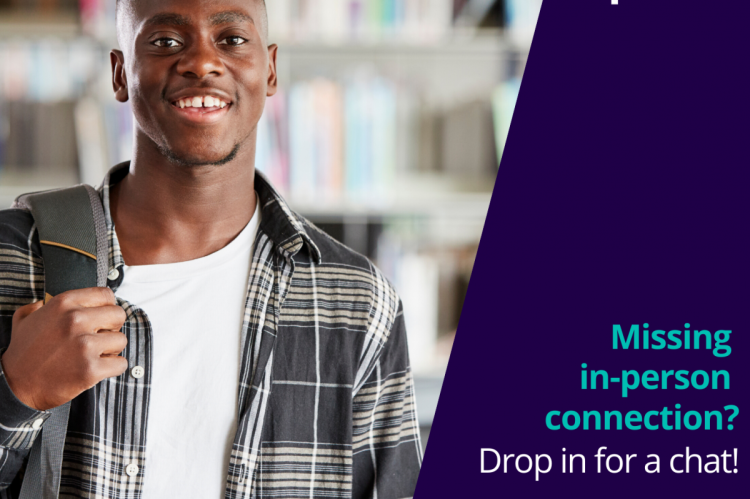 A smiling young man with a plaid shirt and a backpack over one shoulder. The right half of the image is dark purple, with text that reads: "Missing in-person connection? Drop in for a chat!"