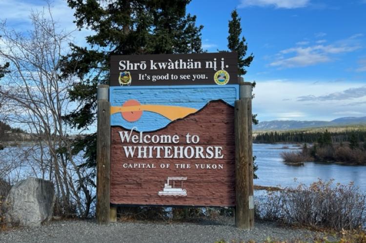 Photograph of the Welcome to Whitehorse sign on the South Access Road.
