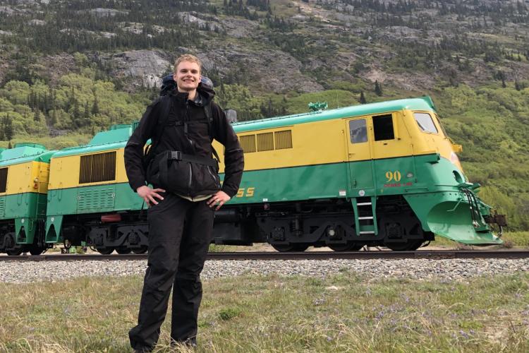 Research student Leif Rupke in front of train