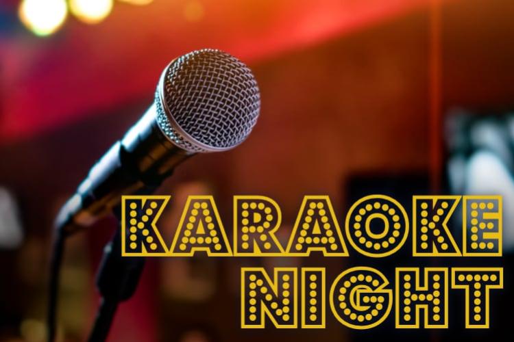 Microphone in front of a red background. Yellow text that reads "Karaoke Night".