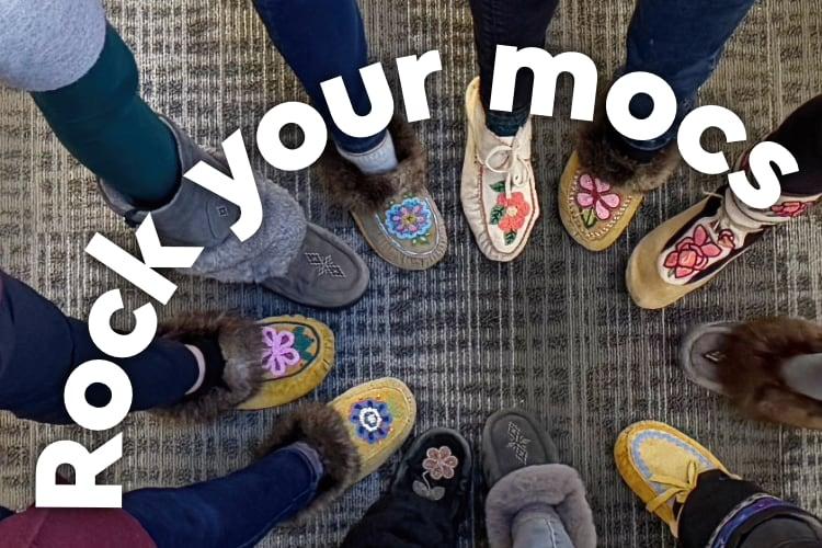 A circle of feet wearing beaded moccasins overlaid with the text "Rock your mocs"