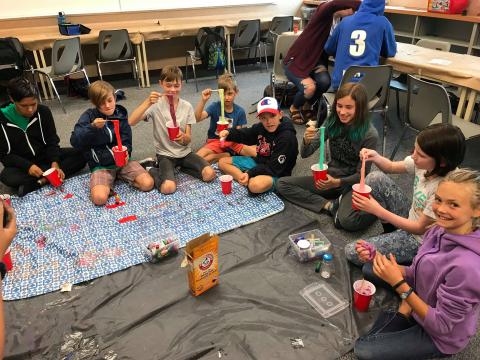 Group of kids with science experiment