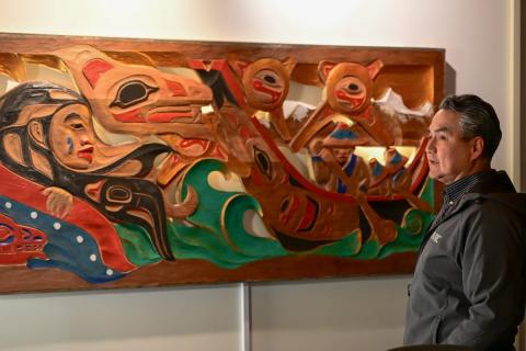 Artist and YukonU assistant professor Vernon Asp talks about restoring his cedar carving entitled Never Give Up.