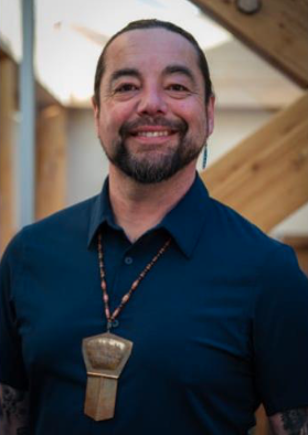 a headshot of Peter Johnston, AVP SI