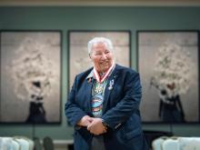 Image of Justice Murray Sinclair, an Indigenous Elder wearing beaded medallion and wearing suit.
