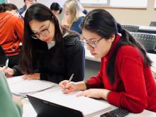 Students of the certificate studying together in a classroom