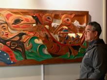 Artist and YukonU assistant professor Vernon Asp talks about restoring his cedar carving entitled Never Give Up.